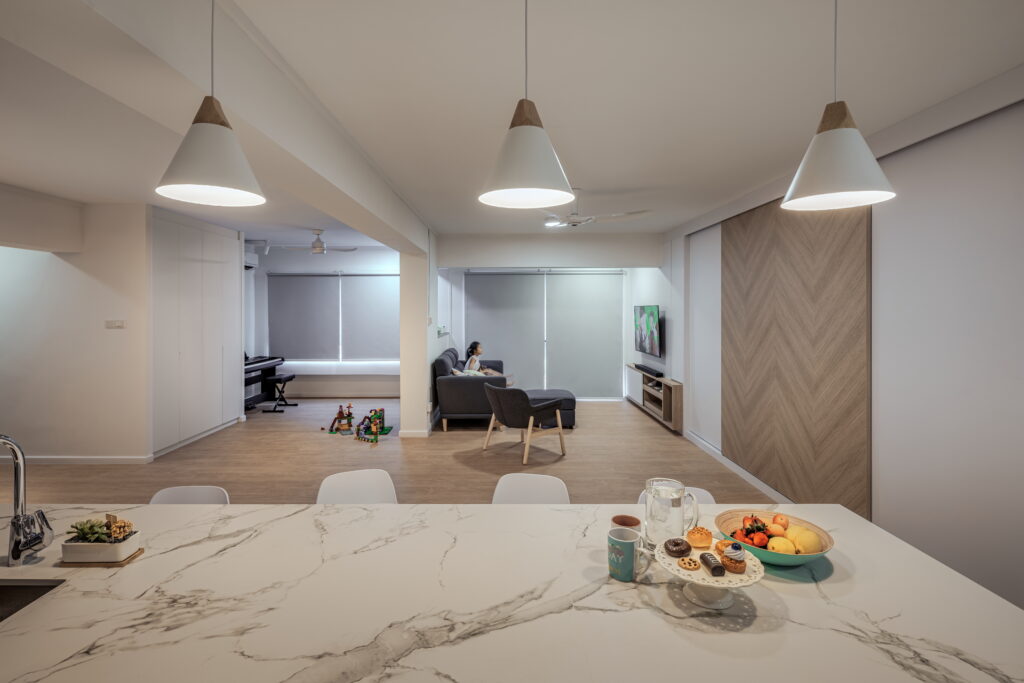 Scandinavian HDB living room design at 544 Jelapang Road by Zenith Arc, featuring sleek, space-saving furniture and a minimalist aesthetic.