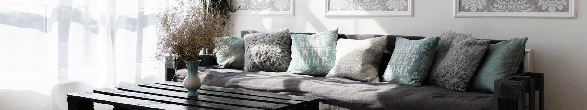 comfy sofa with home sweet home pillows