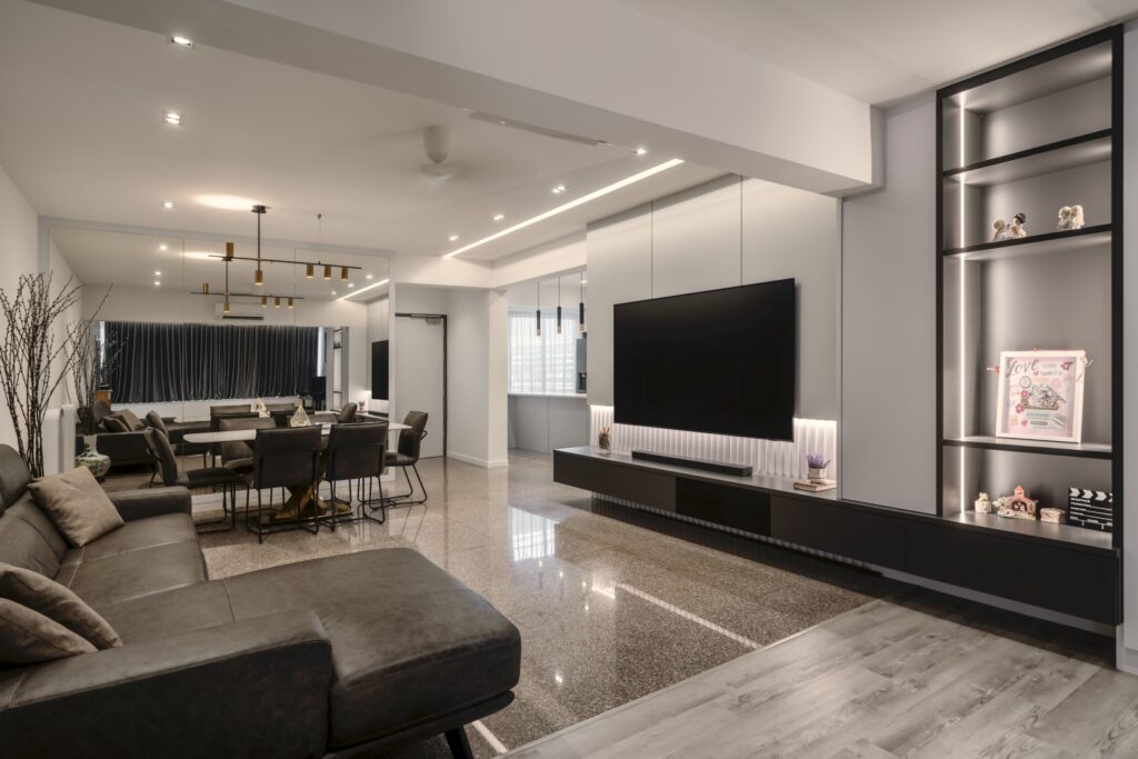 Spacious living area in Singapore HDB flat designed by Zenith Arc with open-plan layout