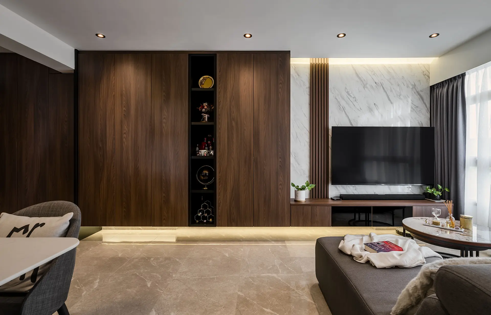 Modern HDB living room at 115A Jalan Ayer with timber feature wall, grey sectional sofa, and marble TV wall by Zenith Arc Singapore.