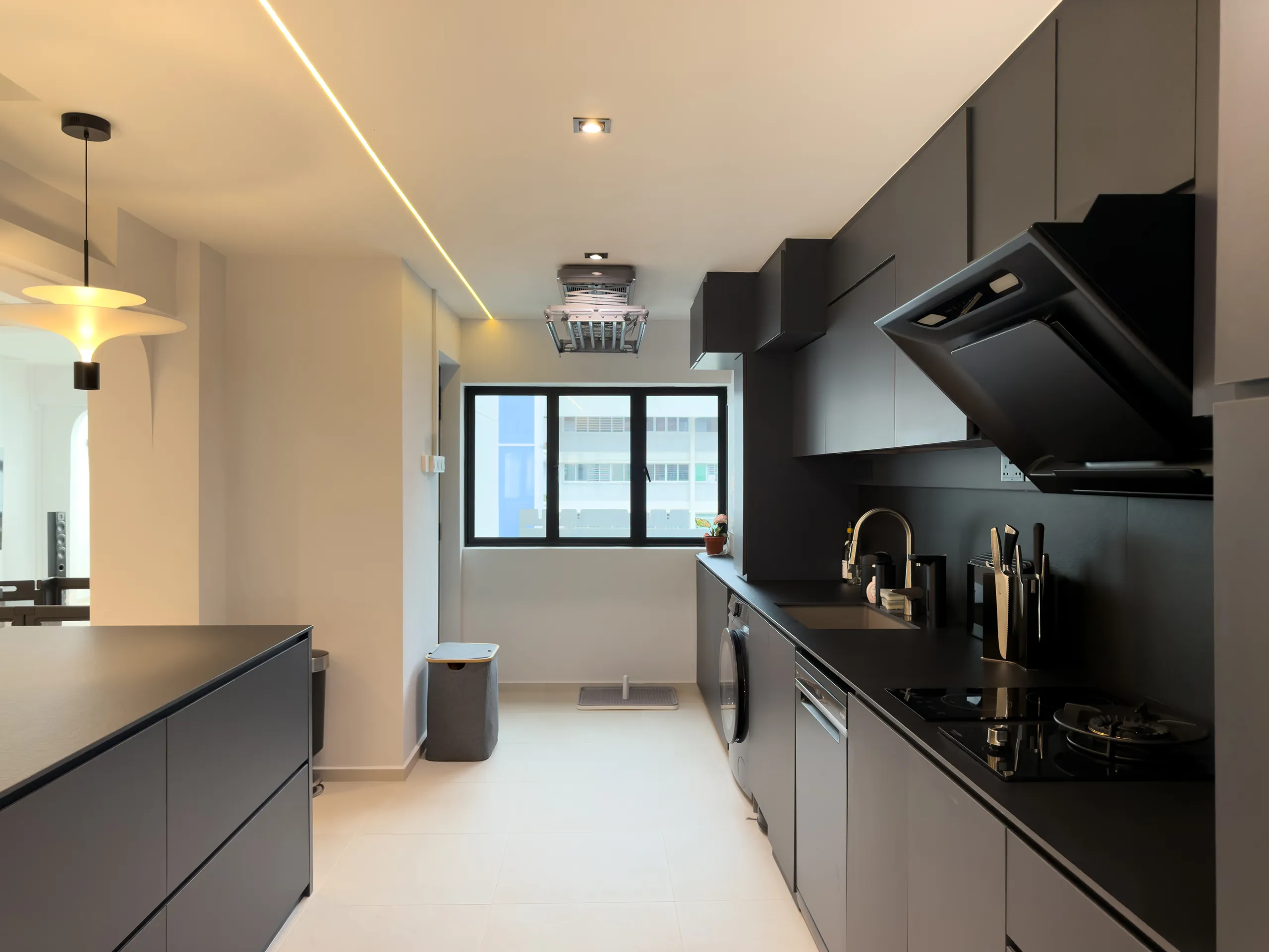Luxury Scandinavian design 717 bedok reservoir rd kitchen with black kitchen cabinet and countertop